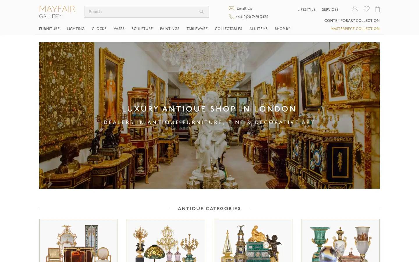 The live Mayfair Gallery homepage: a header with search and ten categories, a wide photo of the South Audley Street showroom headed ‘Luxury antique shop in London’, then the first antique category cards.