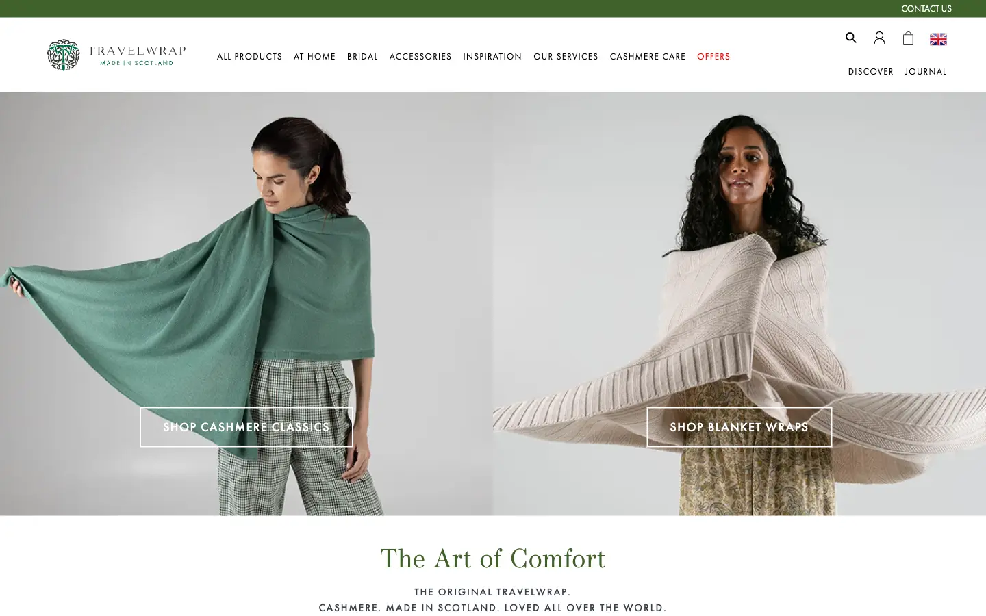 The live Travelwrap homepage: two large photos of models in cashmere wraps, with buttons to shop cashmere classics and blanket wraps, above the line ‘The Art of Comfort’.