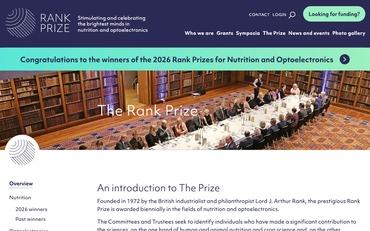 The Rank Prize page: a wide photo of the prize dinner in a library, the line-drawn logo and a side menu of winners for each field.